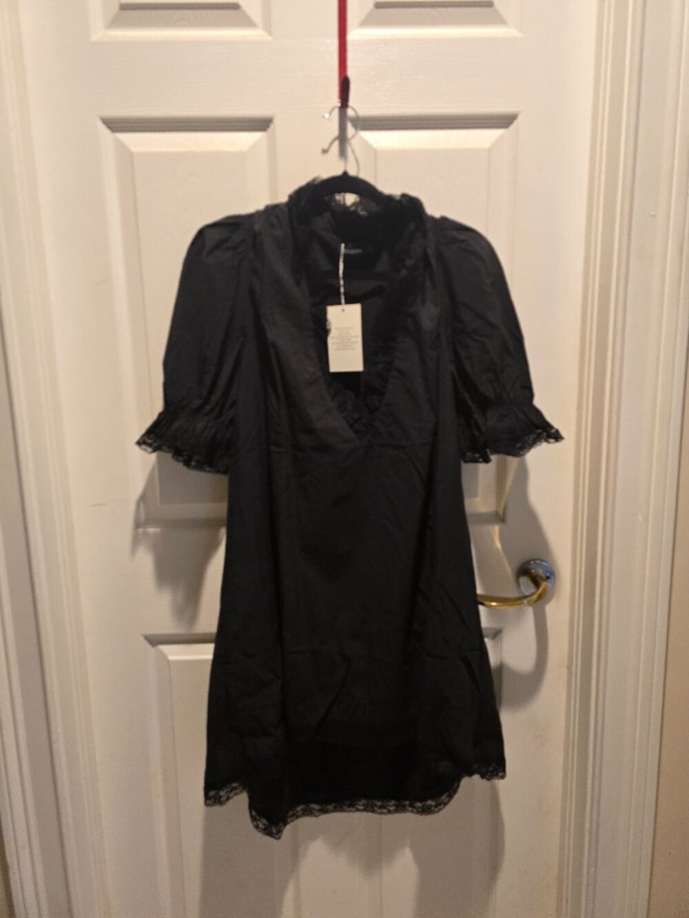 Coherent Black dress with delicate ruffle sleeves